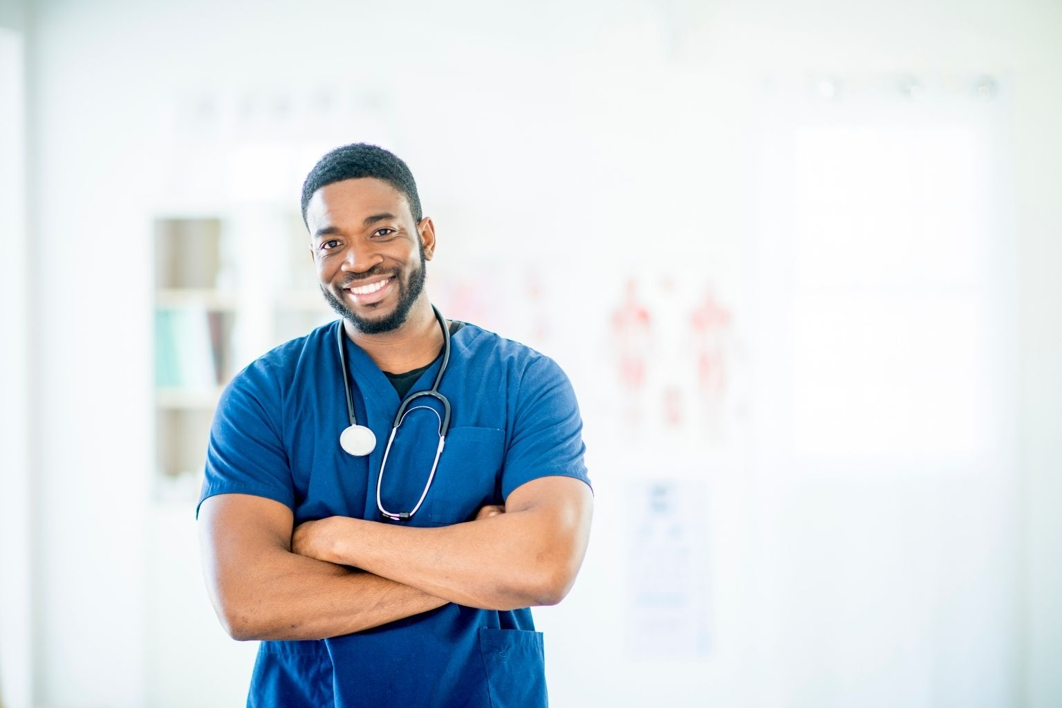 Nursing essay writing service UK with student nurse preparing academic assignment and research notes